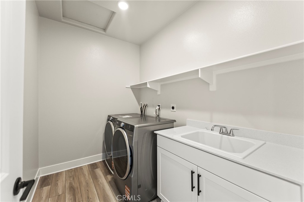 16717 Dara Avenue Chino, CA 91708 - Photo 27 of 41 a utility room with dryer and washer