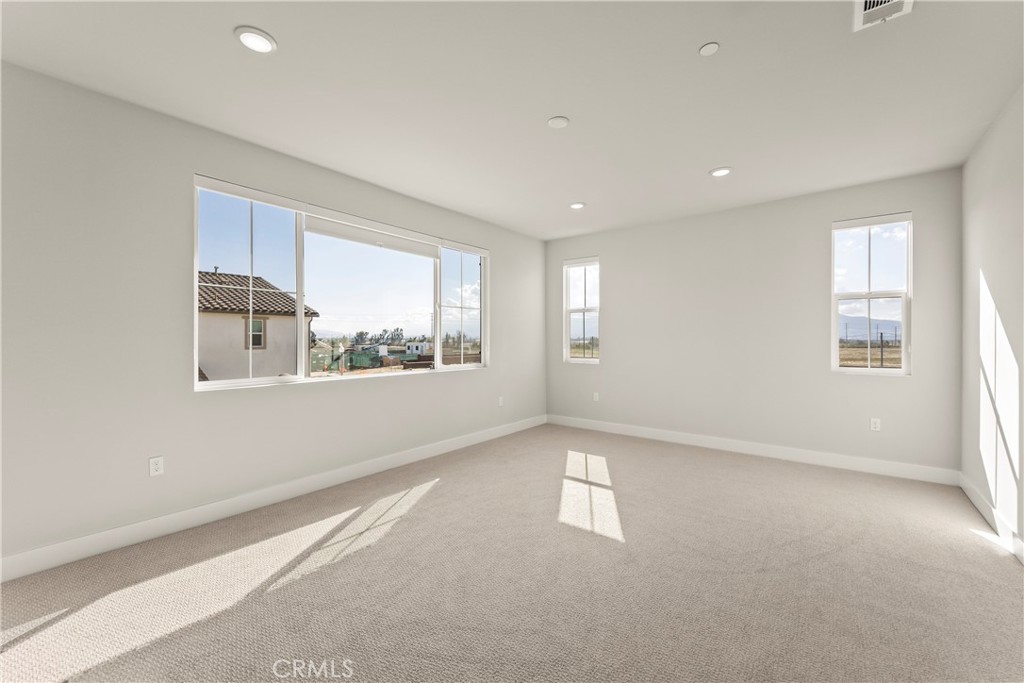 16717 Dara Avenue Chino, CA 91708 - Photo 29 of 41 an empty room with windows