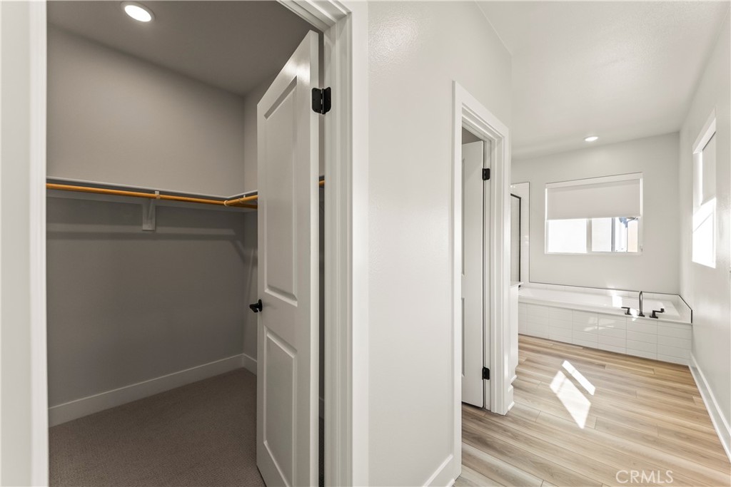 16717 Dara Avenue Chino, CA 91708 - Photo 30 of 41 a view of a walk in closet