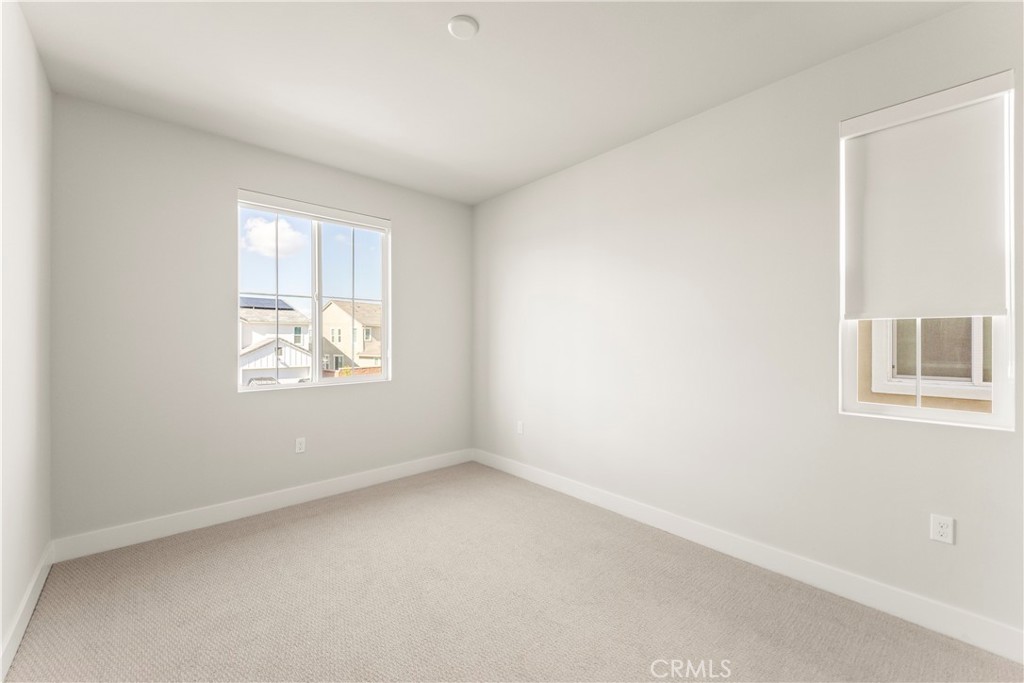 16717 Dara Avenue Chino, CA 91708 - Photo 36 of 41 an empty room with windows