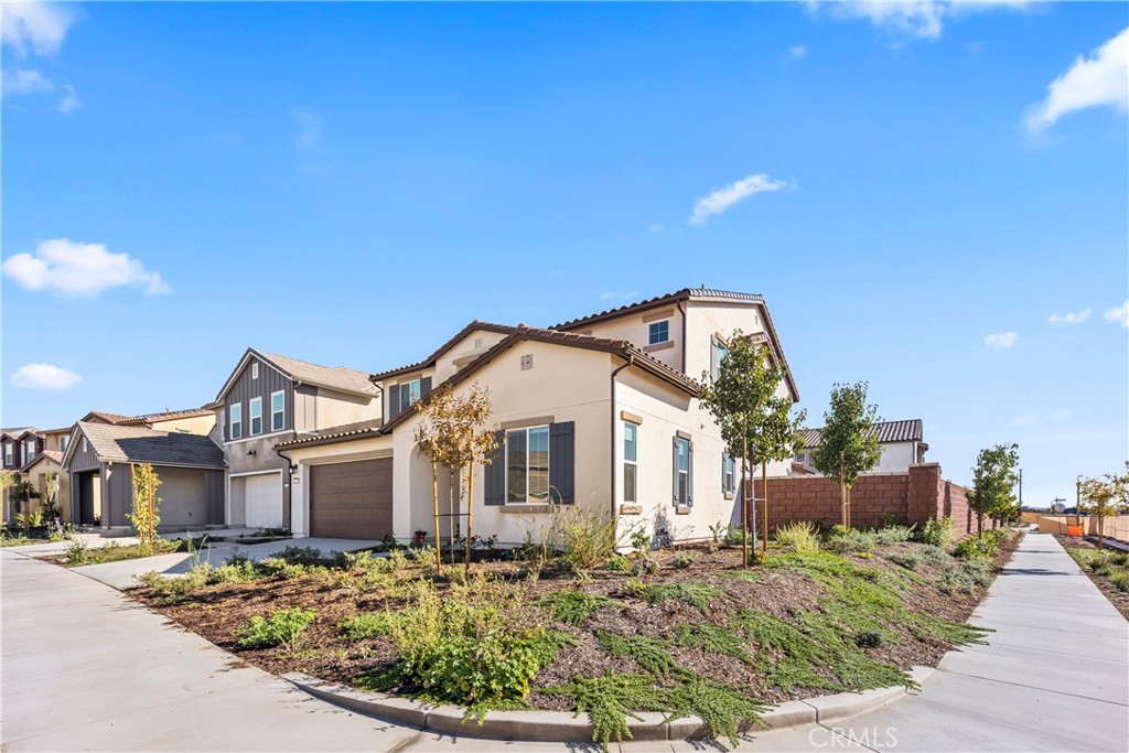 16717 Dara Avenue Chino, CA 91708 - Photo 4 of 41 a front view of a house with a porch