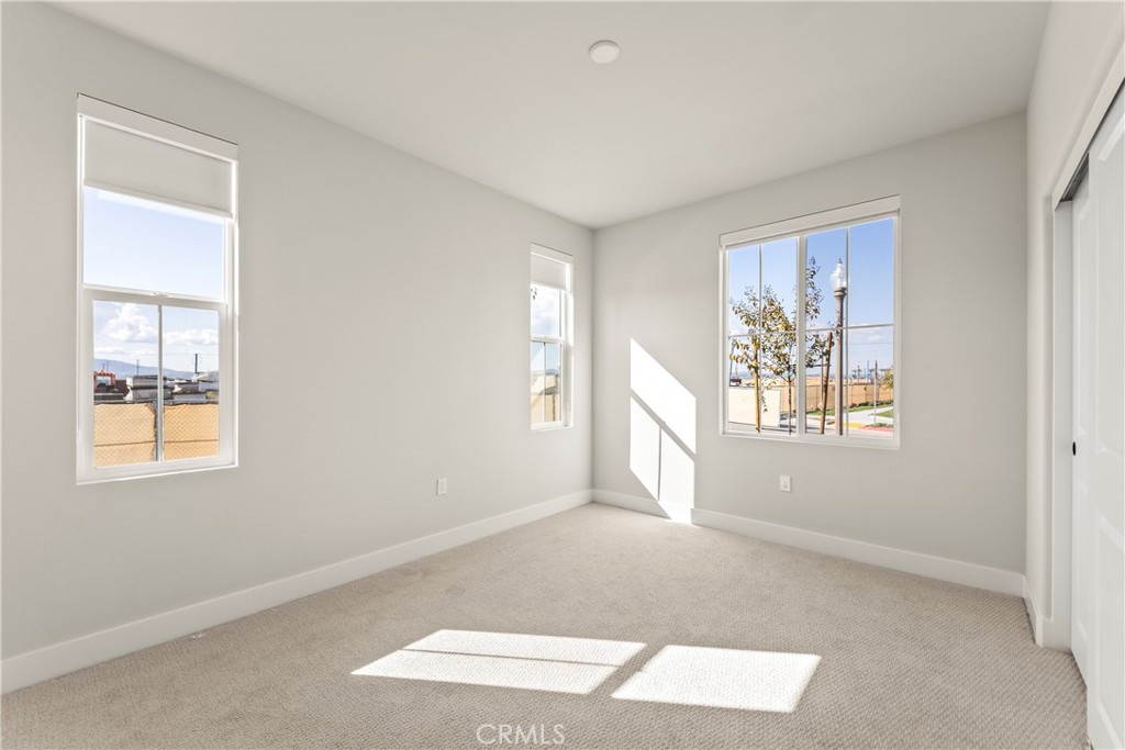 16717 Dara Avenue Chino, CA 91708 - Photo 8 of 41 a view of an empty room with a window
