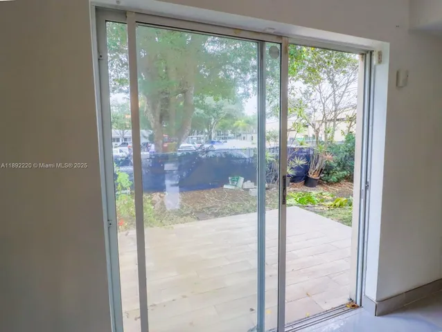 a bathroom with a glass door
