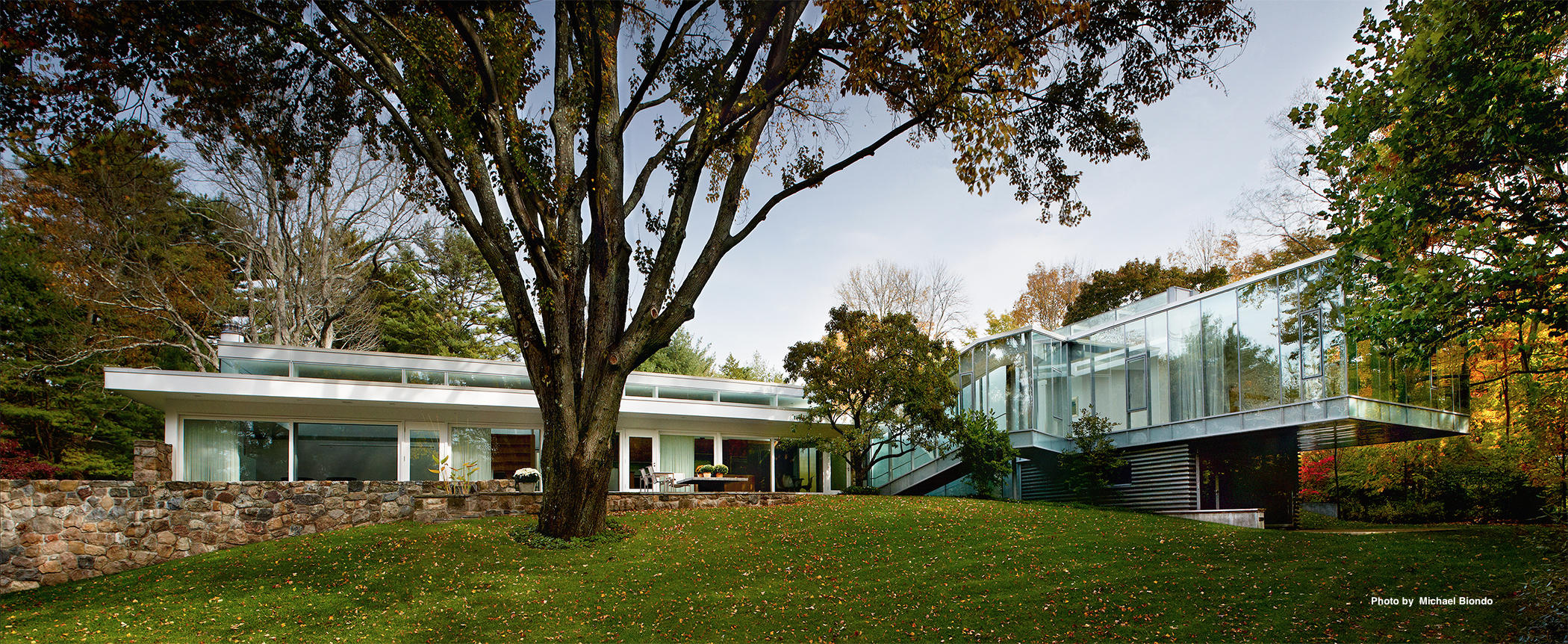 628 West Road New Canaan, CT 06840 - Photo 18 of 28 a front view of a house with garden
