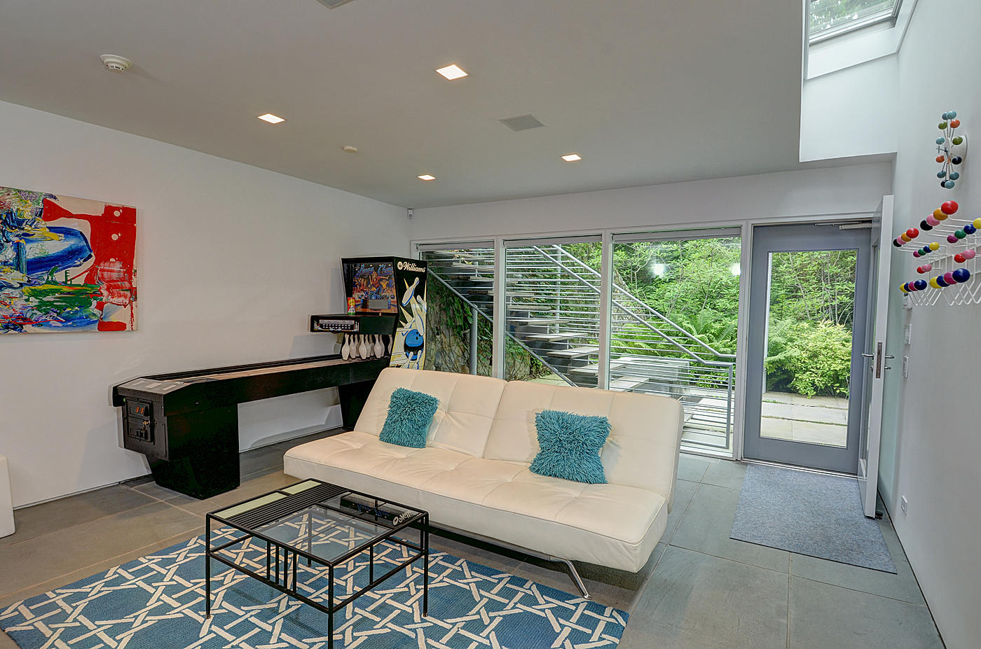 628 West Road New Canaan, CT 06840 - Photo 25 of 28 a living room with furniture and a floor to ceiling window