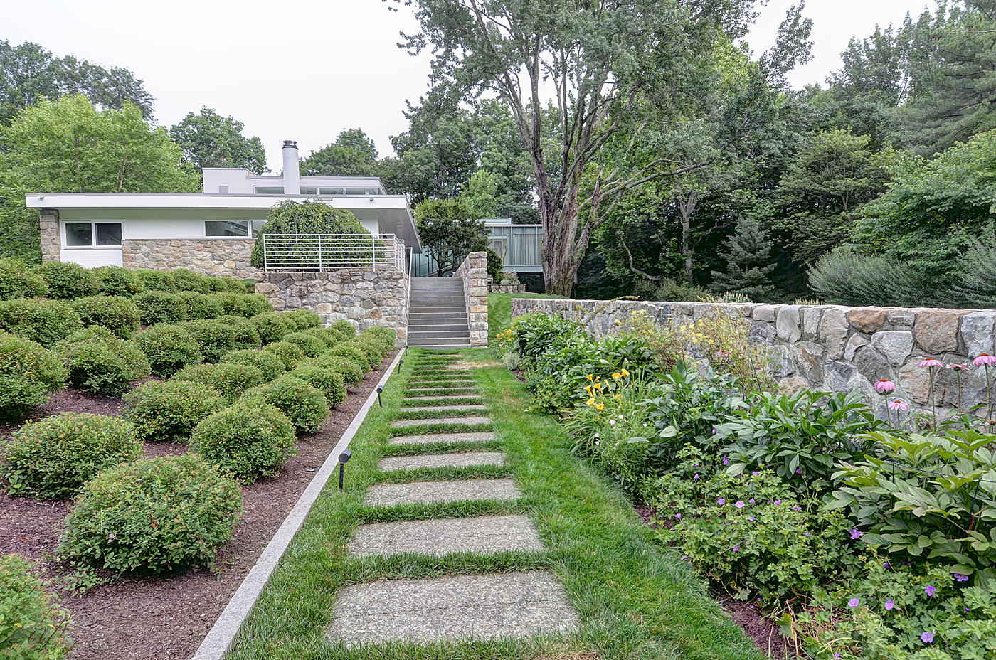 628 West Road New Canaan, CT 06840 - Photo 28 of 28 a view of a garden with pathway