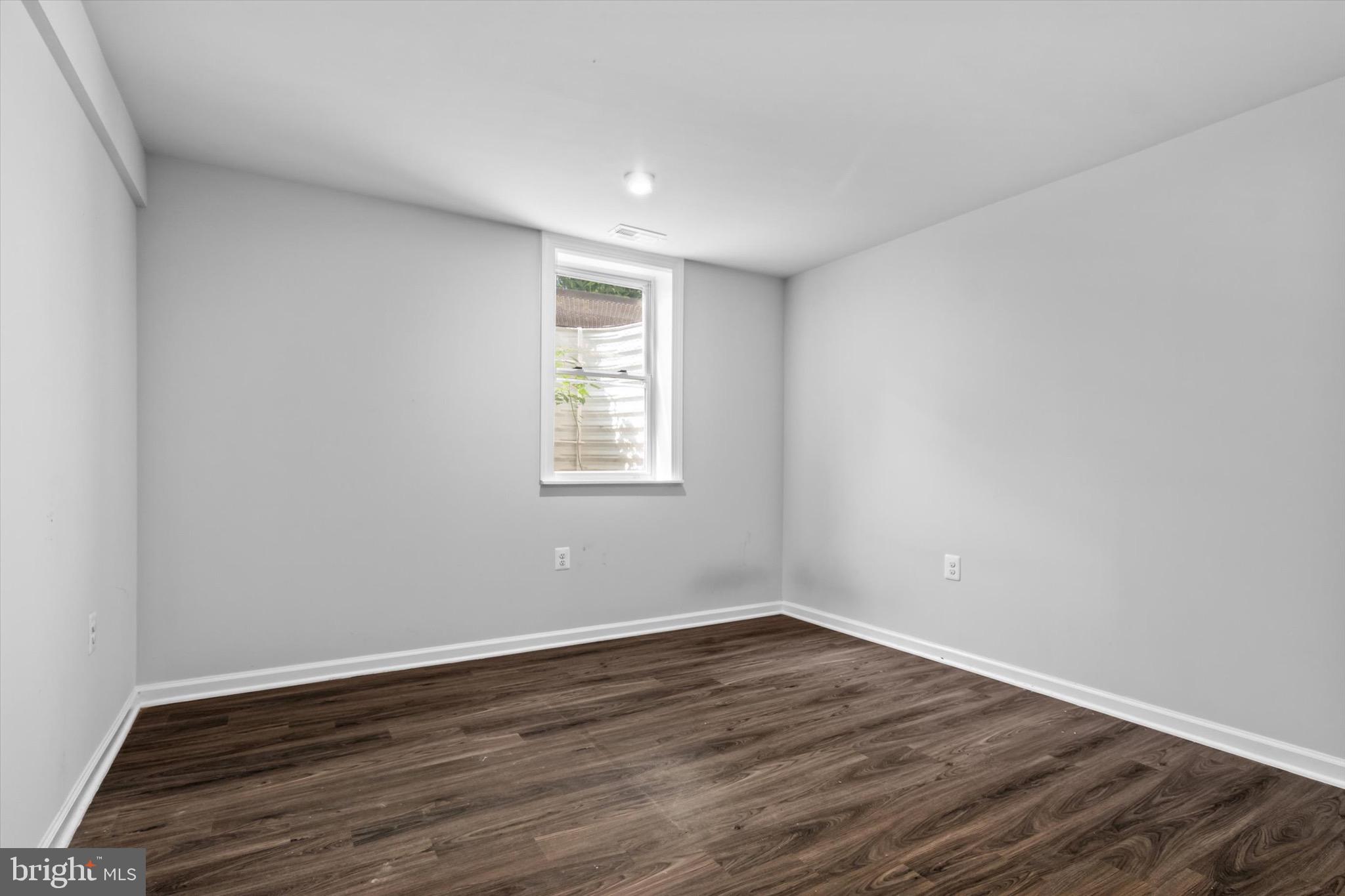 10462 Brackets Ford Circle Manassas, VA 20110 - Photo 28 of 39 a view of a room with wooden floor and window