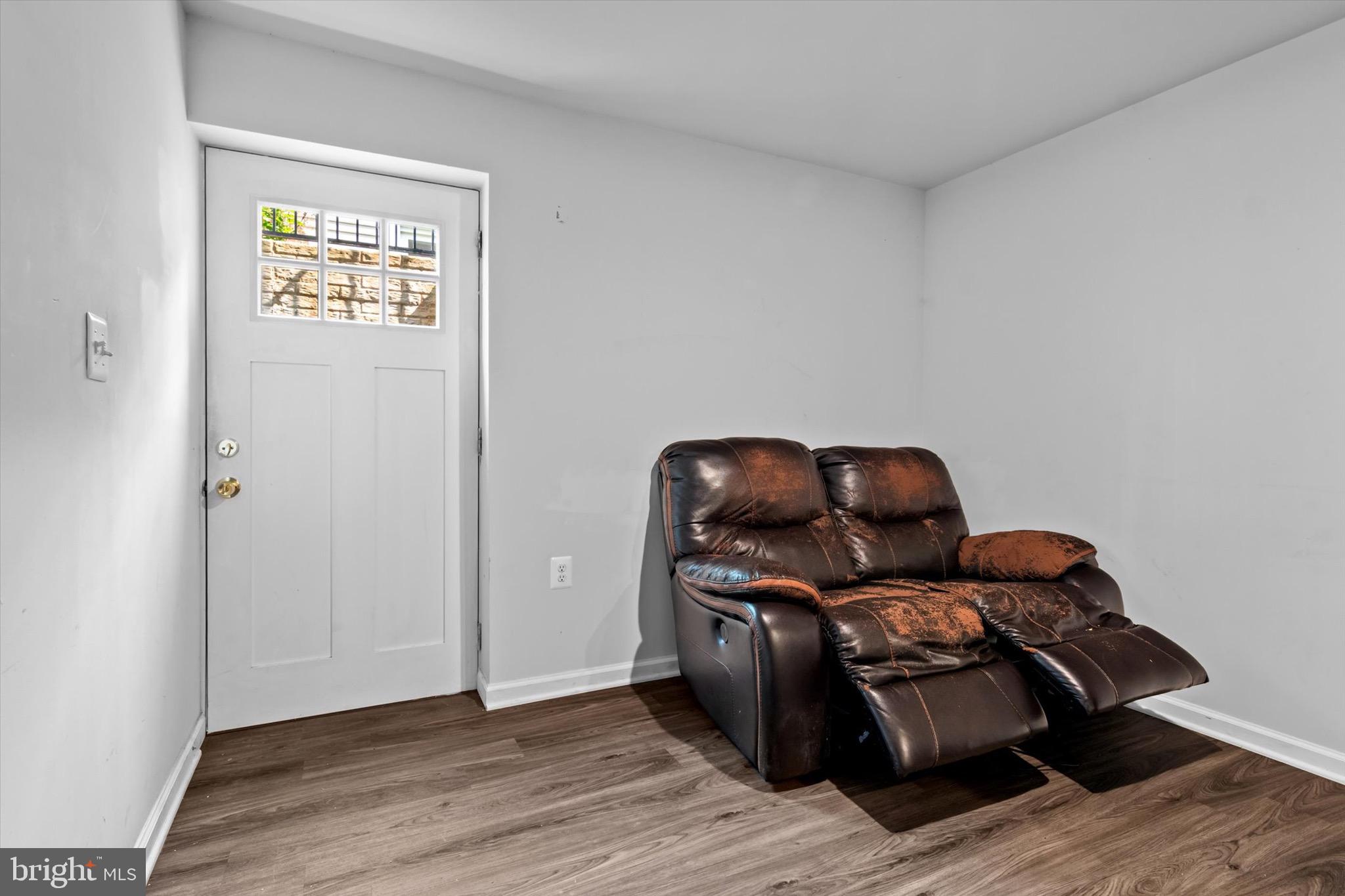 10462 Brackets Ford Circle Manassas, VA 20110 - Photo 31 of 39 a living room with furniture and wooden floor
