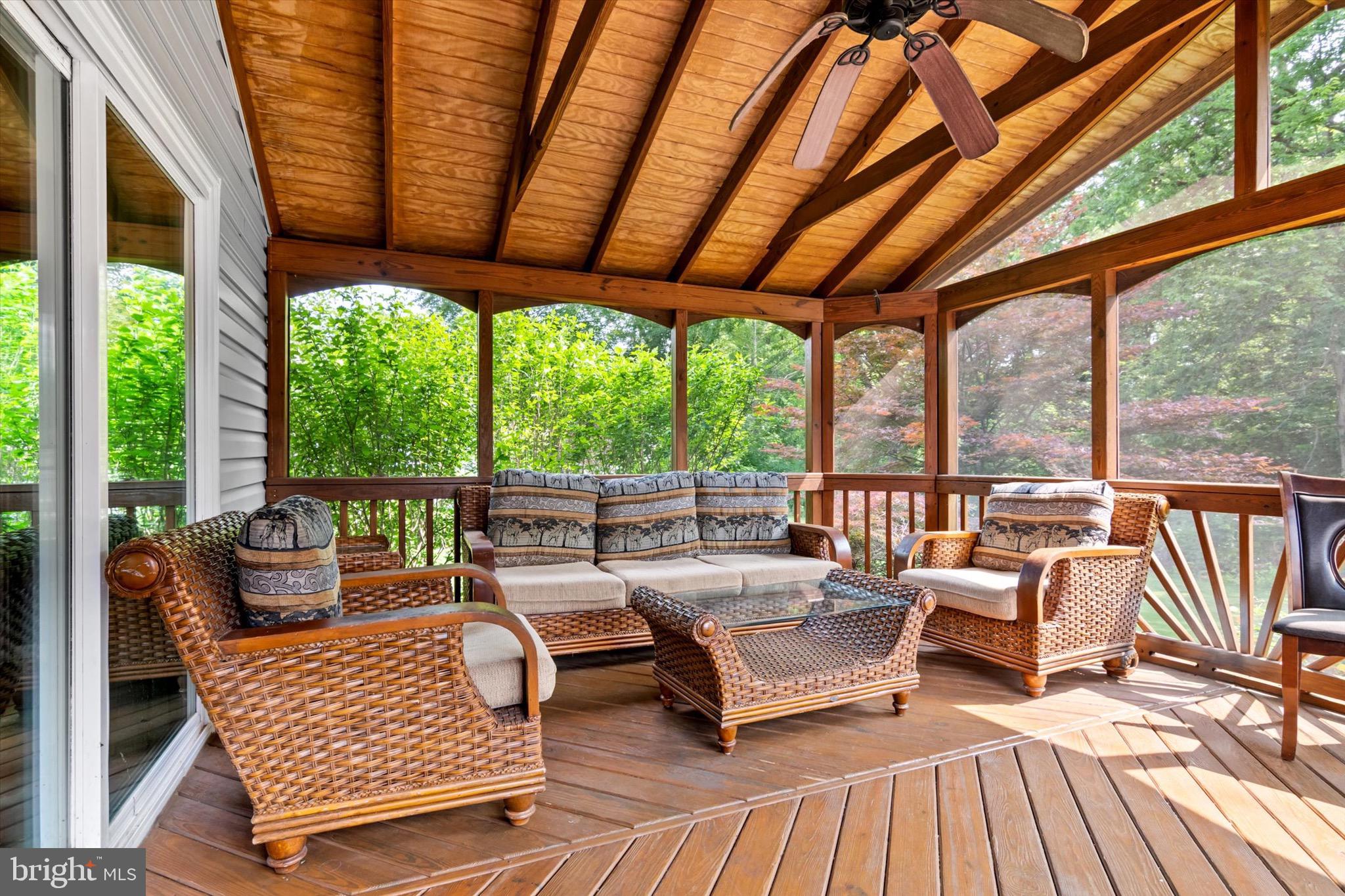 10462 Brackets Ford Circle Manassas, VA 20110 - Photo 33 of 39 a outdoor living room with furniture and a wooden floor
