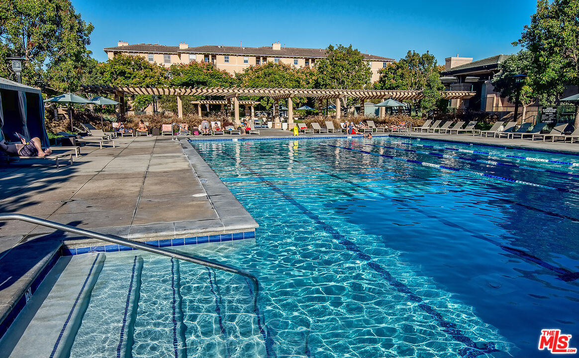 13044 Pacific Promenade, Unit 419 Playa Vista, CA 90094 - Photo 18 of 19 a view of a swimming pool with a patio