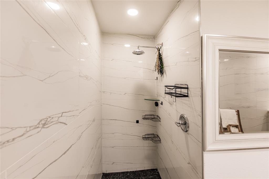 301 Gold Tree Punta Gorda, FL 33955 - Photo 27 of 60 a bathroom with a shower