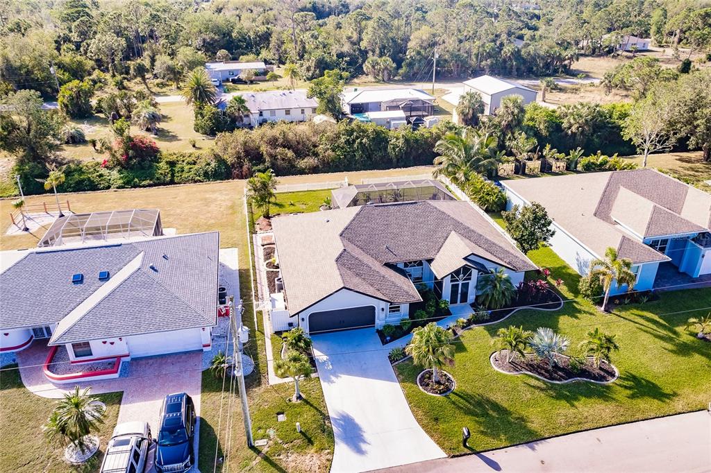 301 Gold Tree Punta Gorda, FL 33955 - Photo 58 of 60 an aerial view of a house with swimming pool and lake view