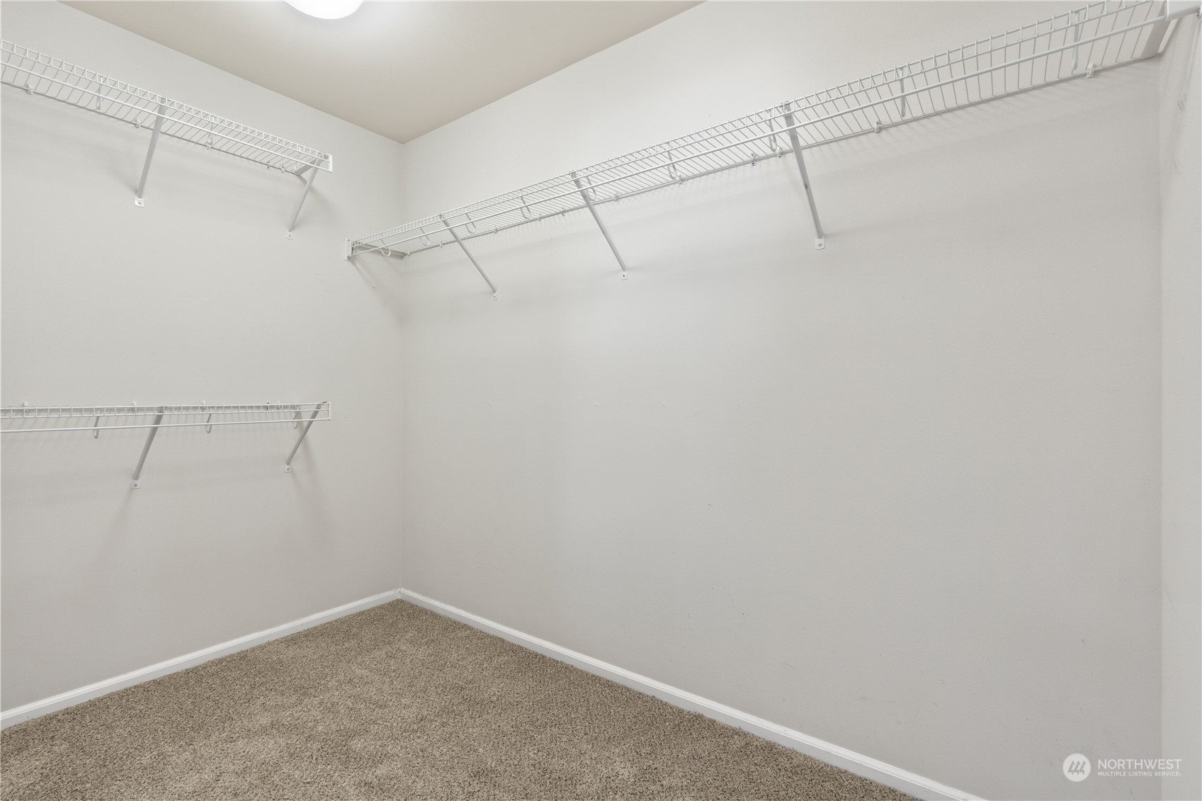 7004 Raptor Avenue Northeast Olympia, WA 98516 - Photo 15 of 28 a view of a room with racks on the wall