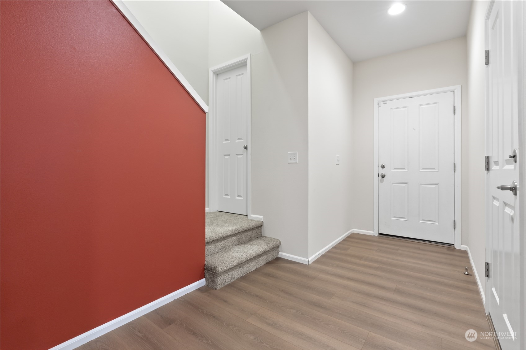 7004 Raptor Avenue Northeast Olympia, WA 98516 - Photo 9 of 28 a view of a hallway with wooden floor