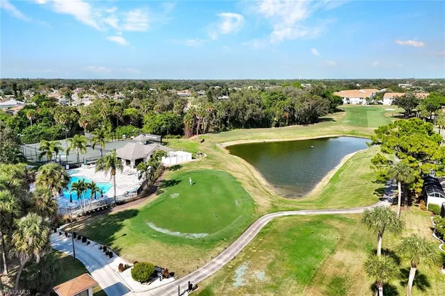 a view of a swimming pool and lake