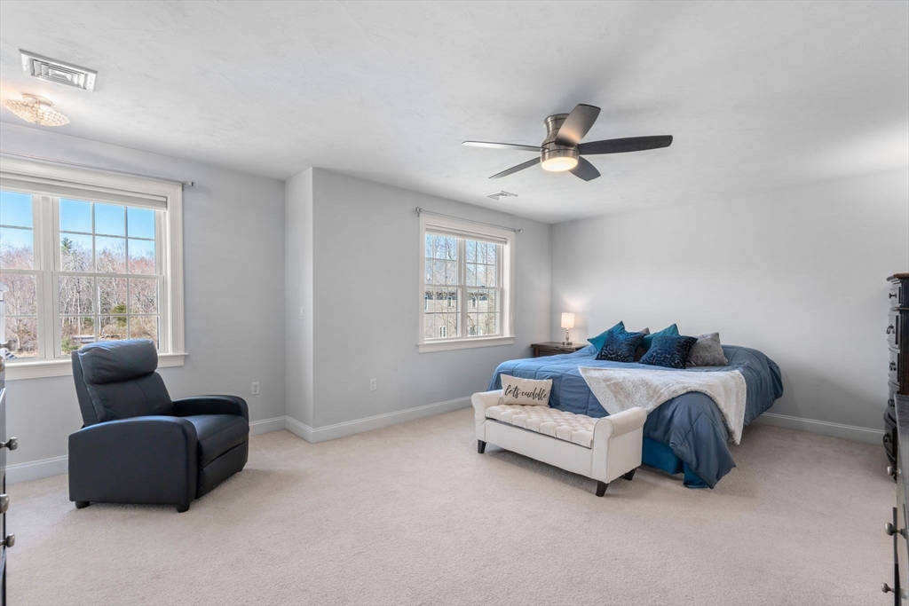 5 Glebe Street Rehoboth, MA 02769 - Photo 15 of 42 a bedroom with bed couch and window