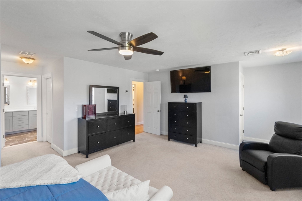 5 Glebe Street Rehoboth, MA 02769 - Photo 17 of 42 a living room with furniture and a flat screen tv