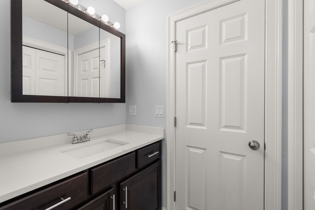 5 Glebe Street Rehoboth, MA 02769 - Photo 20 of 42 a bathroom with a sink and a mirror