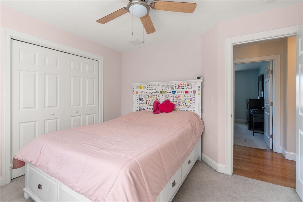 5 Glebe Street Rehoboth, MA 02769 - Photo 22 of 42 a bed room with a bed and a closet