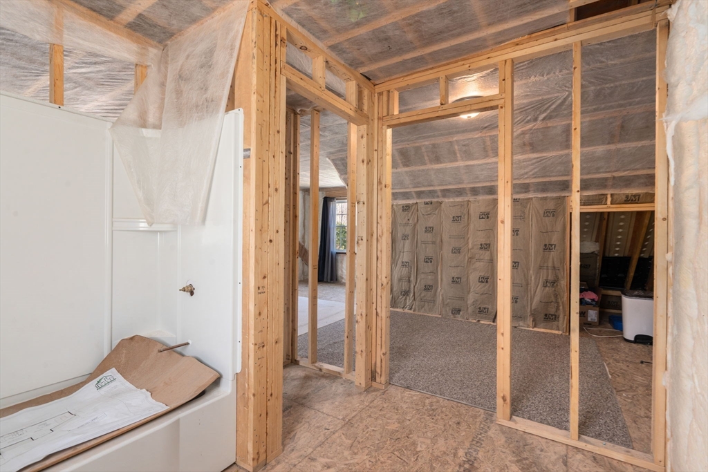 5 Glebe Street Rehoboth, MA 02769 - Photo 28 of 42 a bathroom with a tub and shower