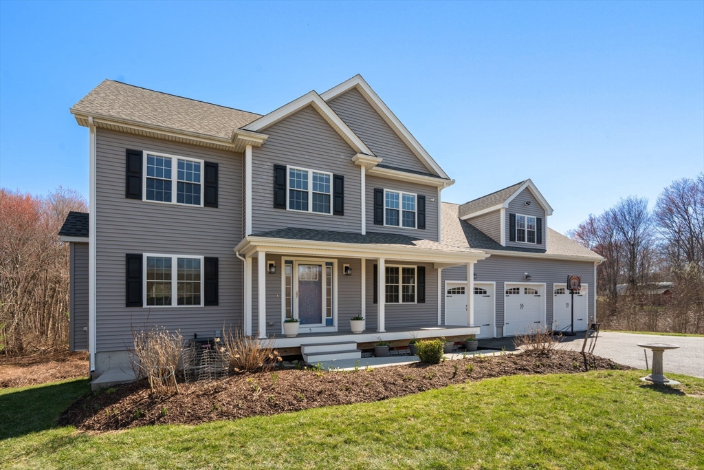 5 Glebe Street Rehoboth, MA 02769 - Photo 3 of 42 a front view of a house with garden and porch