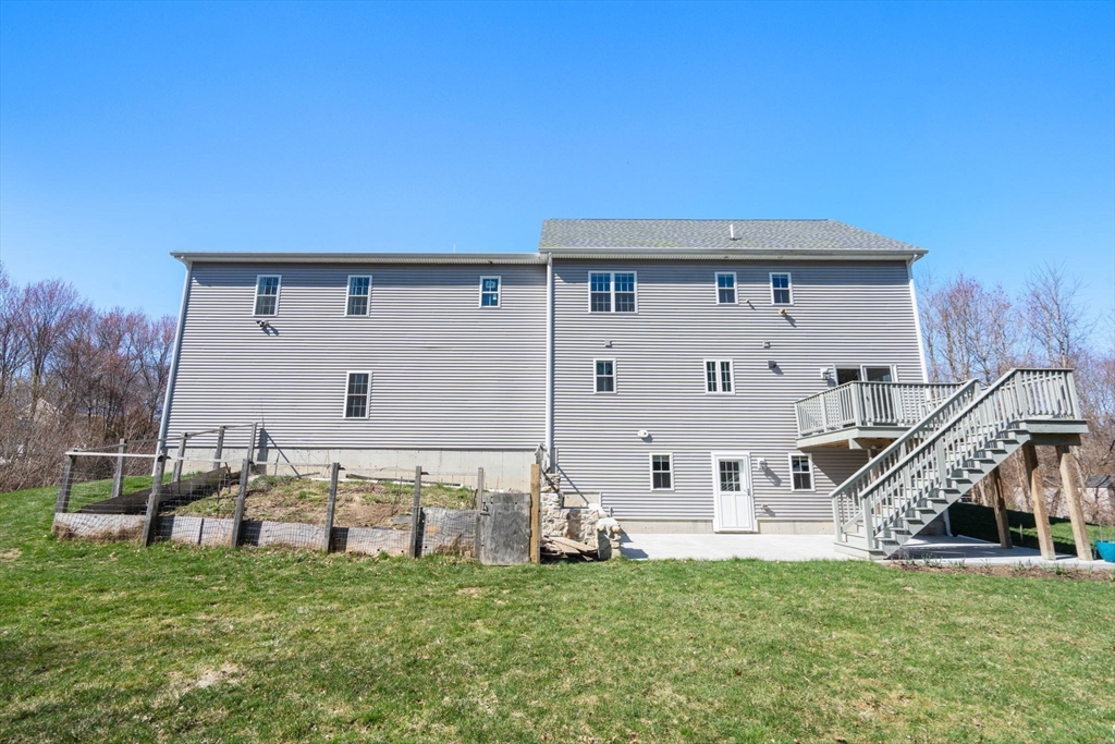 5 Glebe Street Rehoboth, MA 02769 - Photo 34 of 42 a view of a house with a back yard