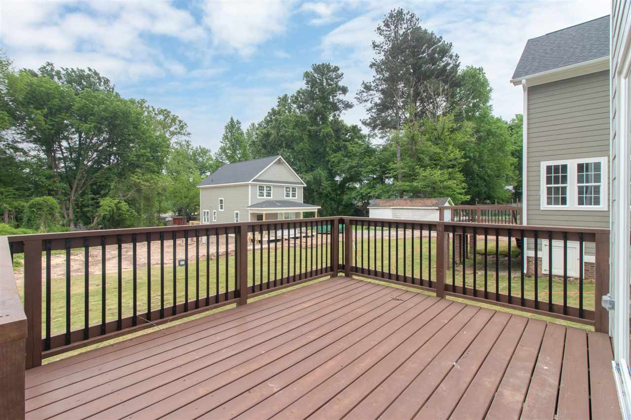 2929 Chapel Hill Road Durham, NC 27707 - Photo 14 of 25 a view of a wooden roof deck