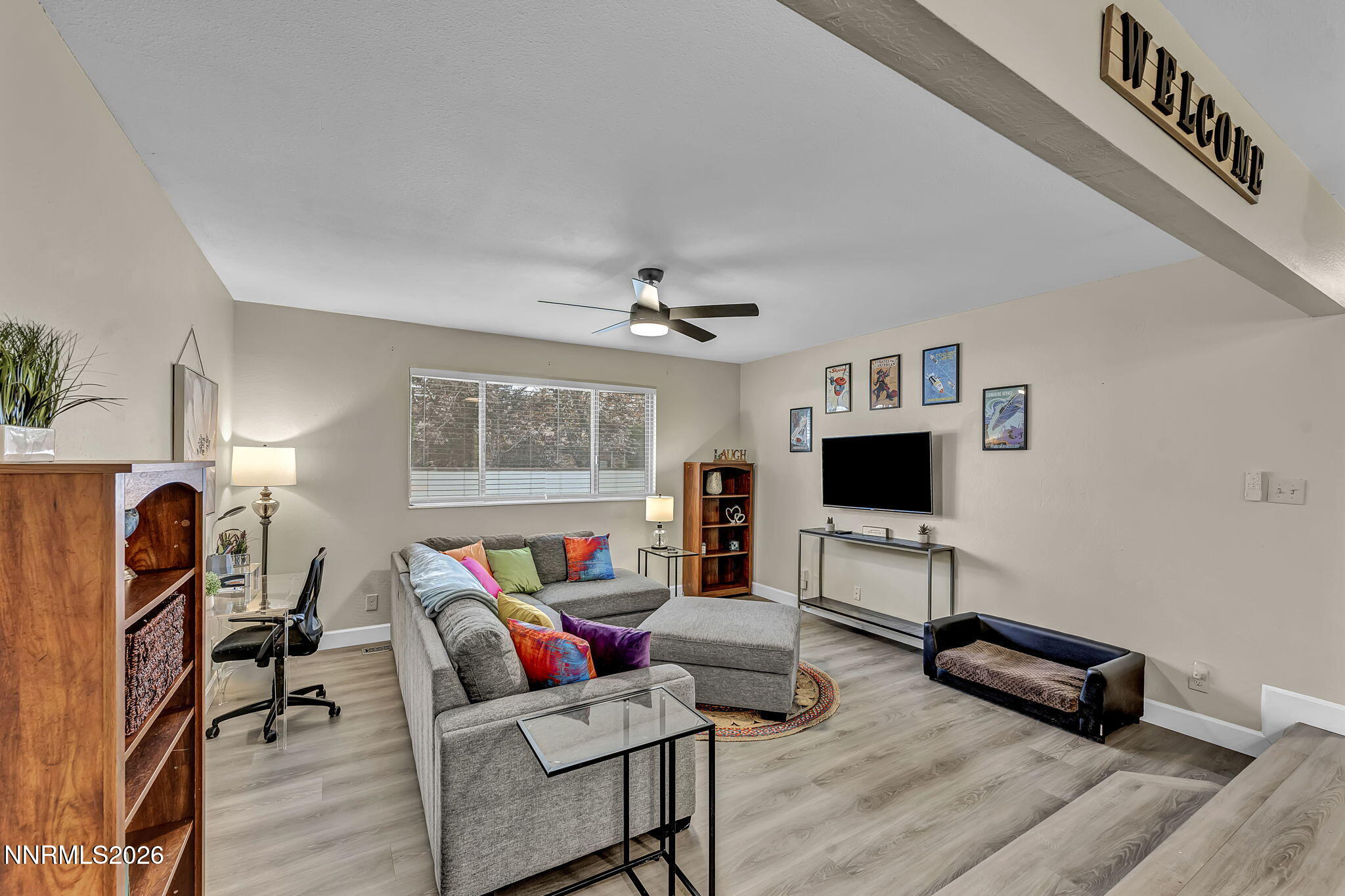 1490 Foster Drive Reno, NV 89509 - Photo 13 of 53 a living room with furniture and a flat screen tv