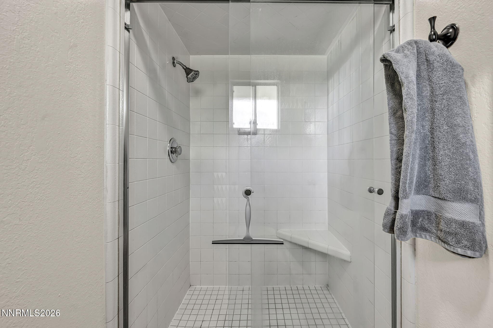 1490 Foster Drive Reno, NV 89509 - Photo 32 of 53 a bathroom with a shower
