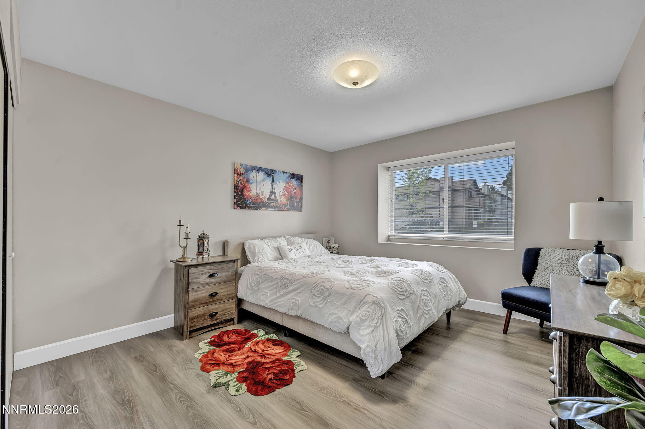 1490 Foster Drive Reno, NV 89509 - Photo 36 of 53 a bedroom with a bed and dresser
