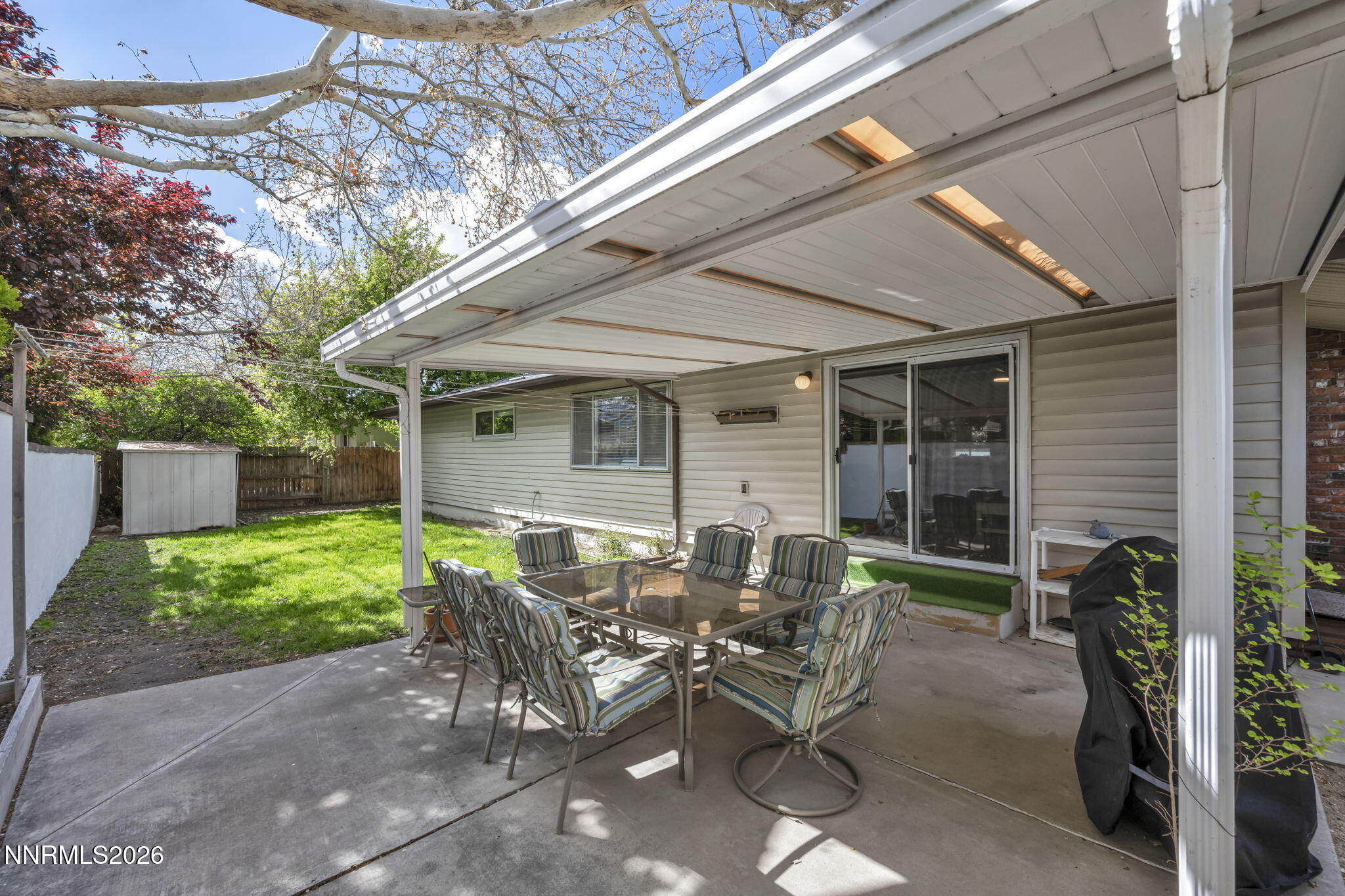 1490 Foster Drive Reno, NV 89509 - Photo 44 of 53 a view of backyard with outdoor seating and plants