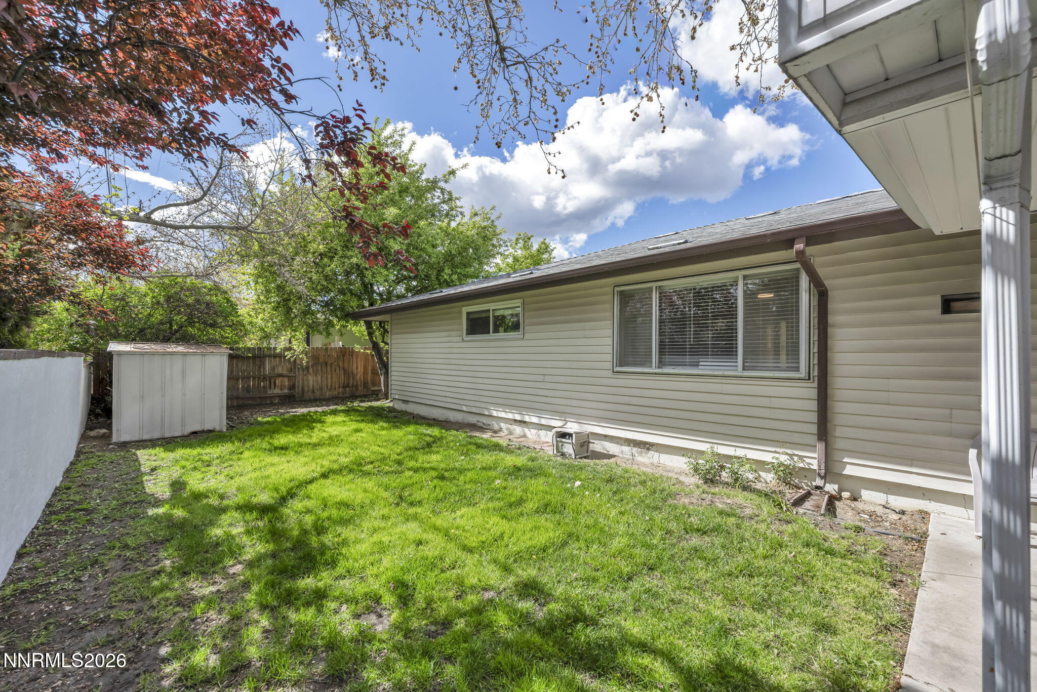 1490 Foster Drive Reno, NV 89509 - Photo 47 of 53 a backyard of a house with lots of green space