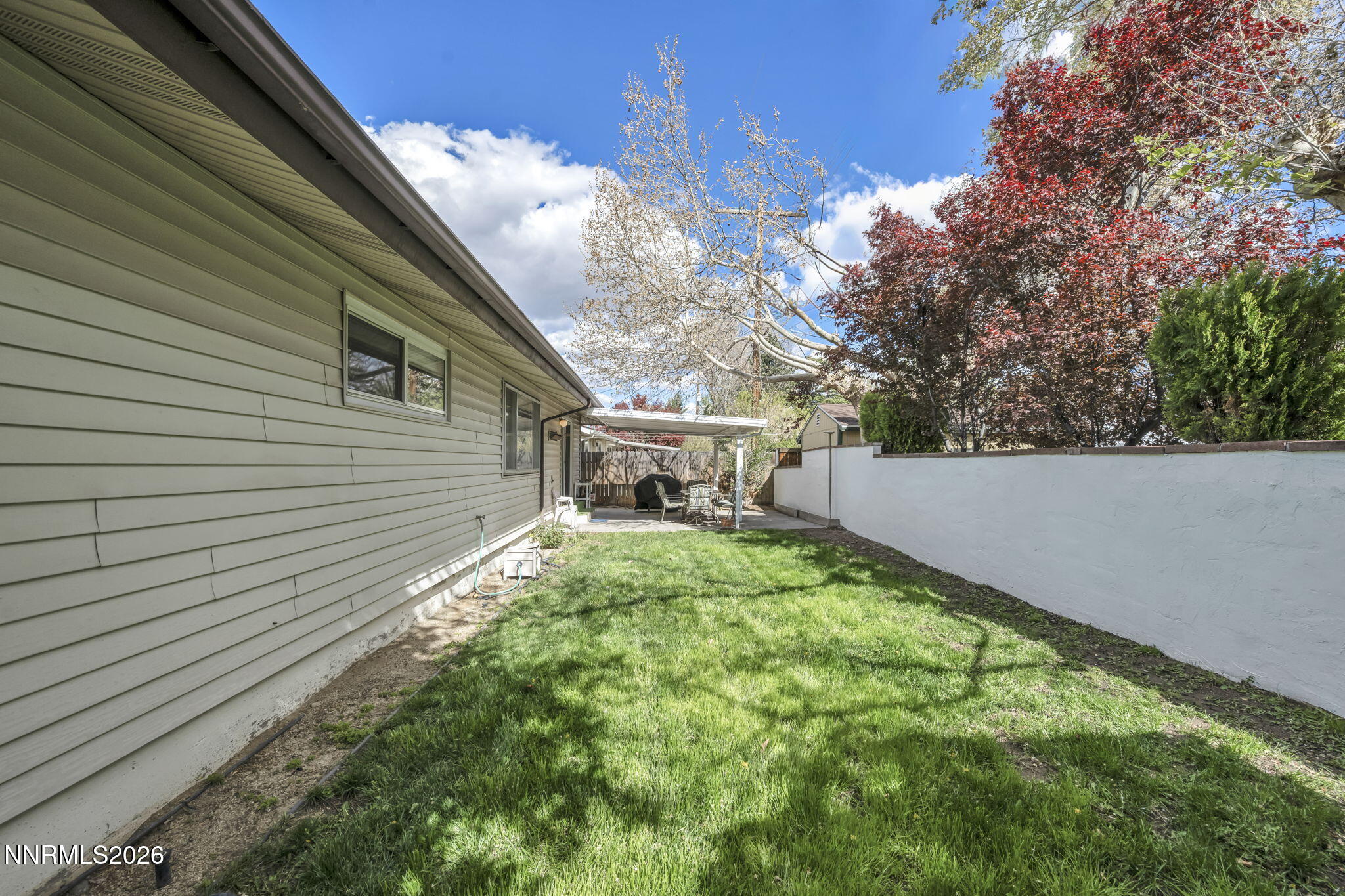 1490 Foster Drive Reno, NV 89509 - Photo 49 of 53 a view of backyard with sitting area