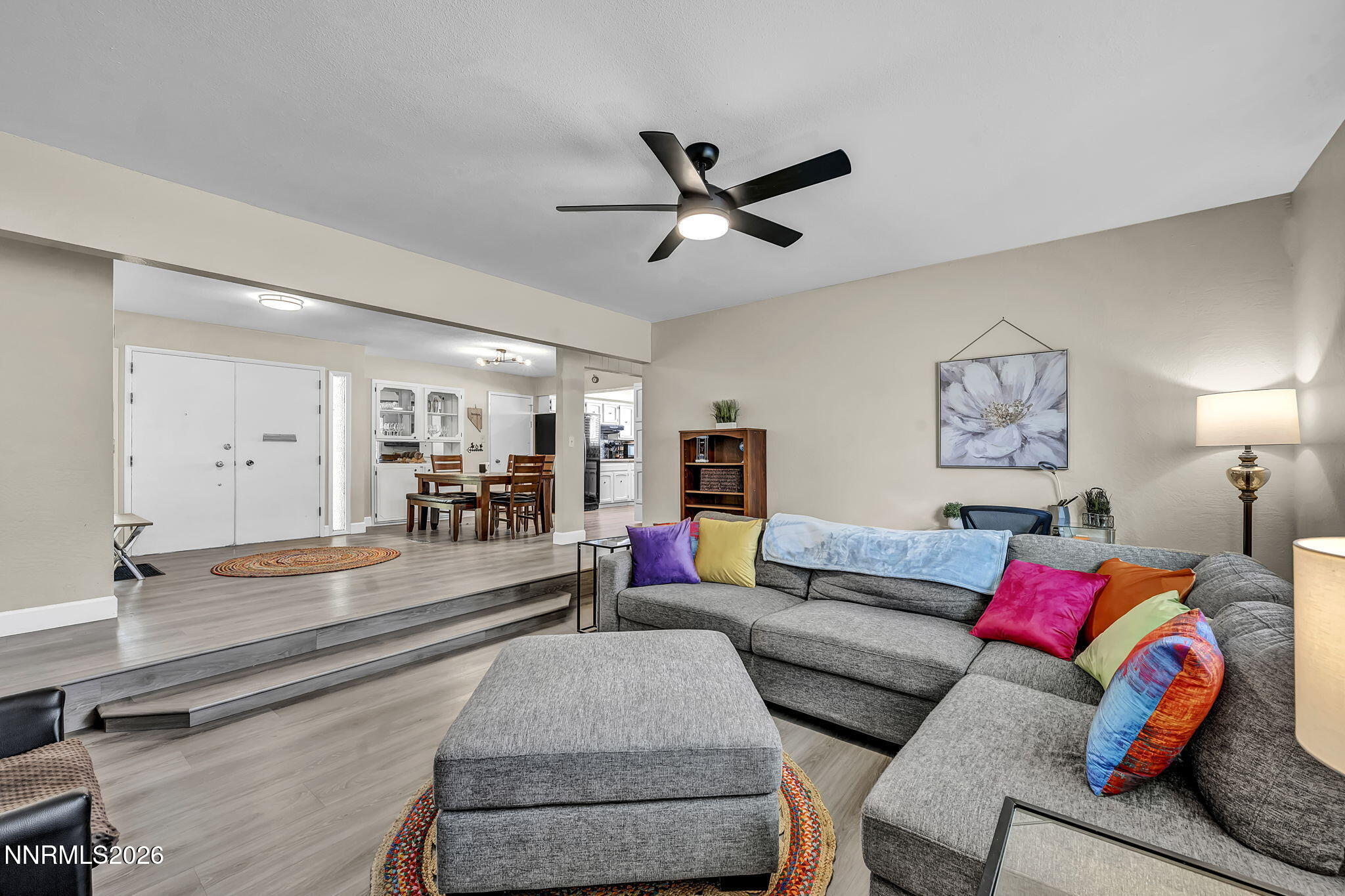 1490 Foster Drive Reno, NV 89509 - Photo 8 of 53 a living room with furniture and a wooden floor