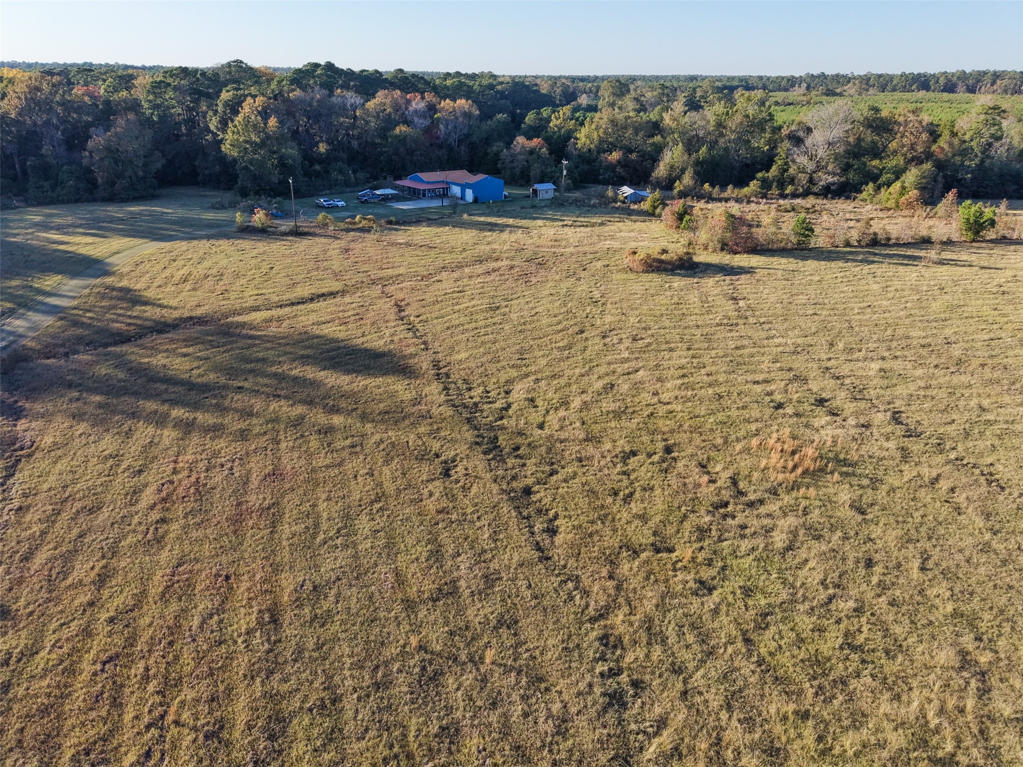 6950 Fm 945 Street North Coldspring, TX 77331 - Photo 1 of 34 20 acres and barndominium for sale. Pasture land and woods.