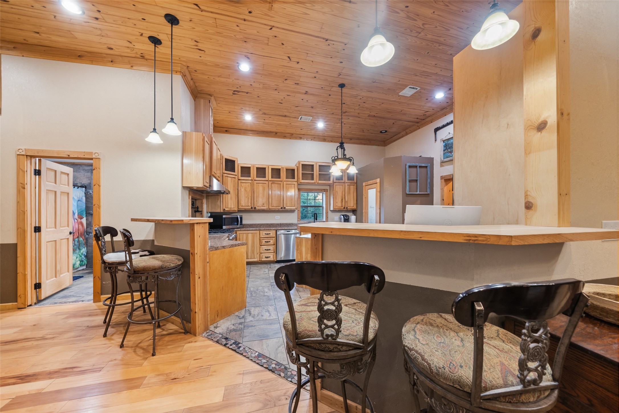 6950 Fm 945 Street North Coldspring, TX 77331 - Photo 15 of 29 a dining room with furniture and wooden floor