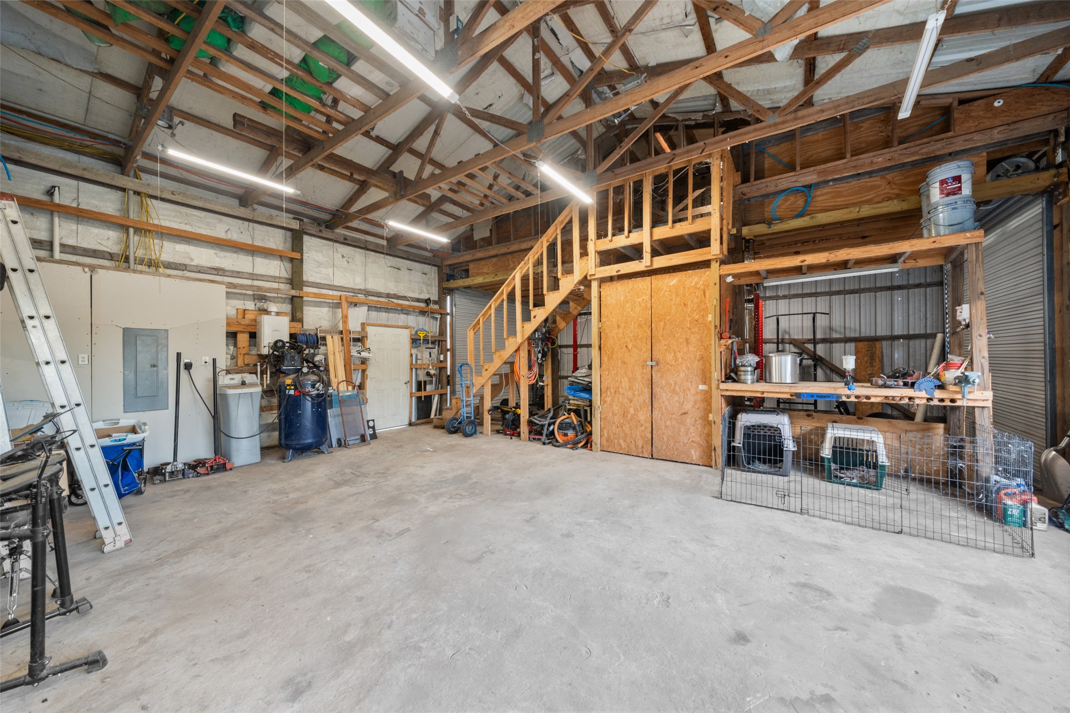 6950 Fm 945 Street North Coldspring, TX 77331 - Photo 27 of 29 a view of a storage room with a fridge
