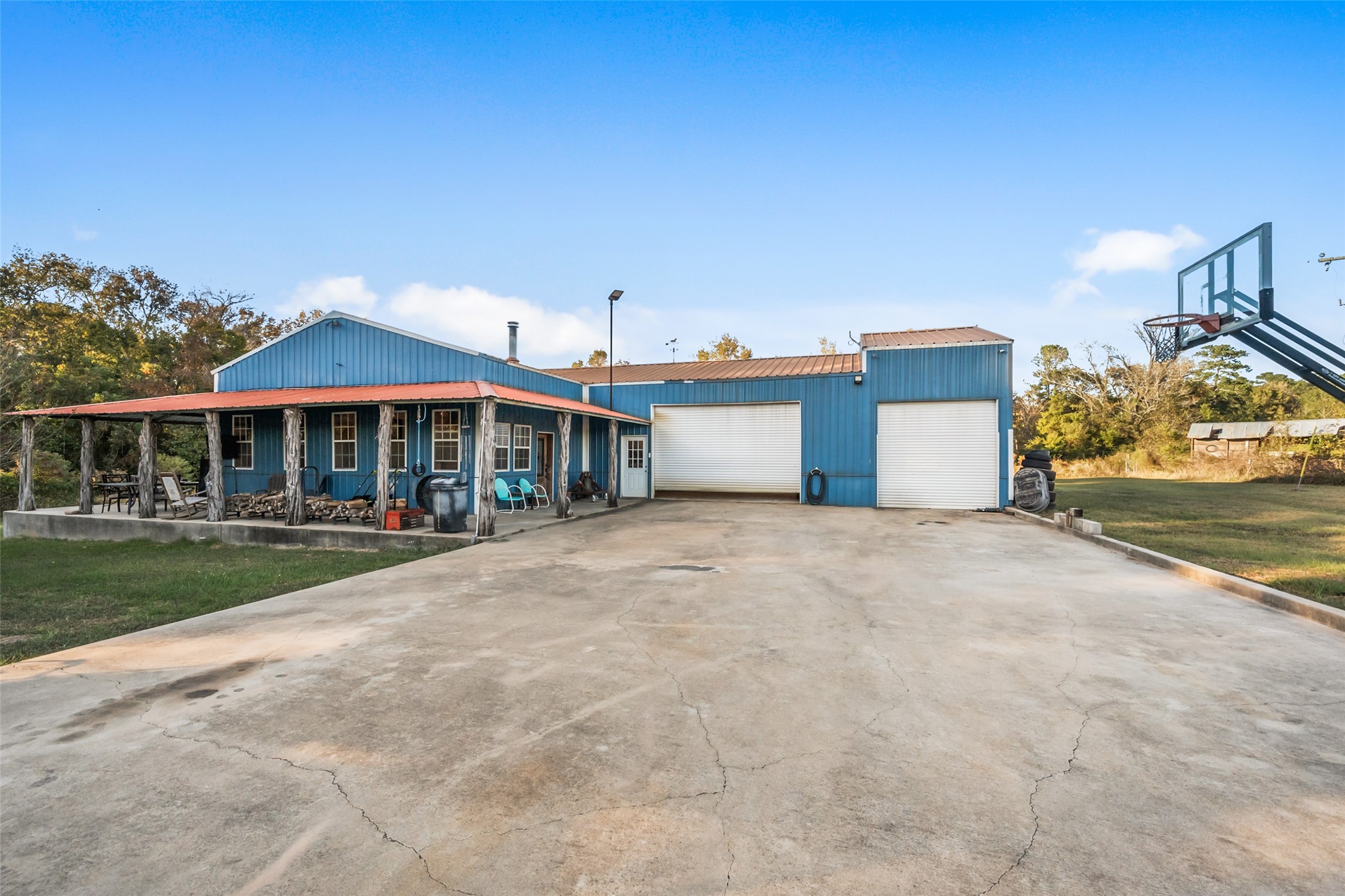 6950 Fm 945 Street North Coldspring, TX 77331 - Photo 29 of 29 a front view of a house with a yard