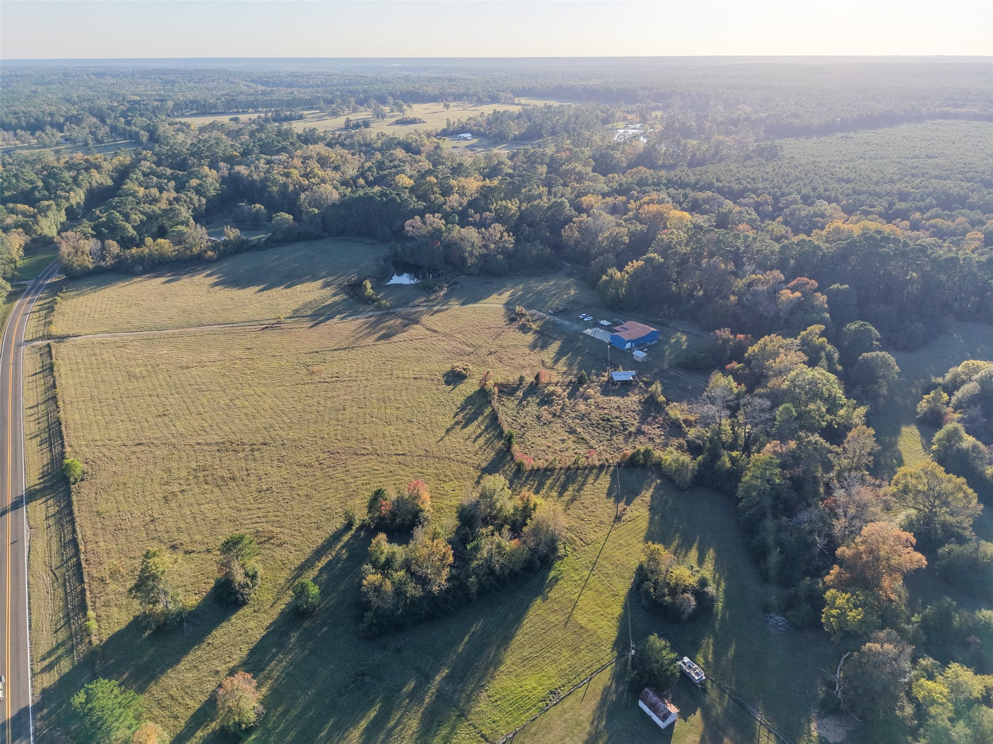 6950 Fm 945 Street North Coldspring, TX 77331 - Photo 5 of 29 an aerial view of a city