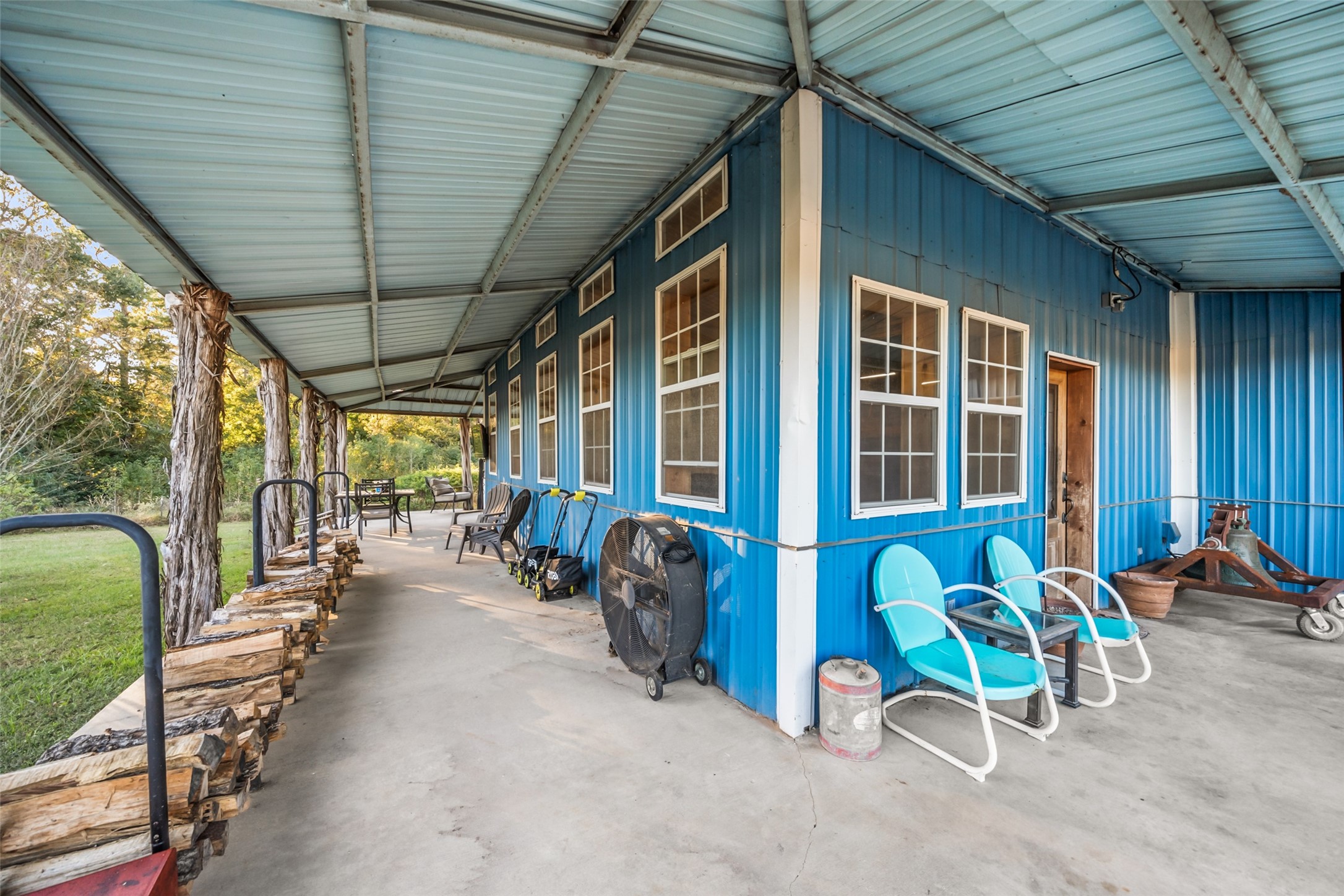 6950 Fm 945 Street North Coldspring, TX 77331 - Photo 8 of 29 a view of a chairs in a balcony