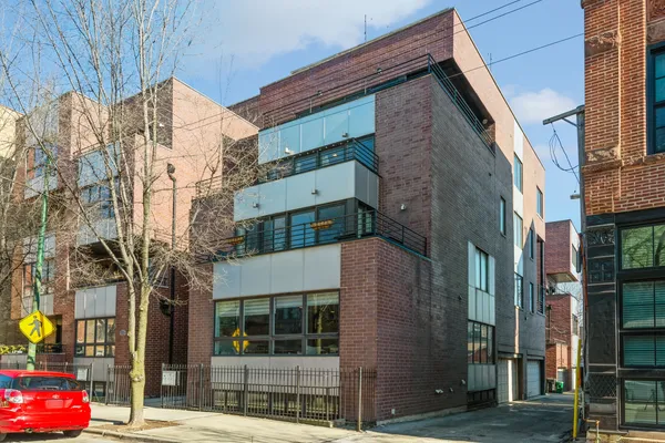 a front view of a building with street