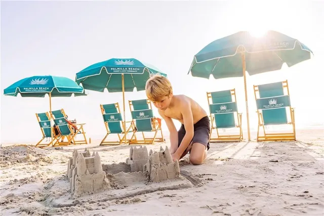 a view of a swimming pool with a lounge chairs