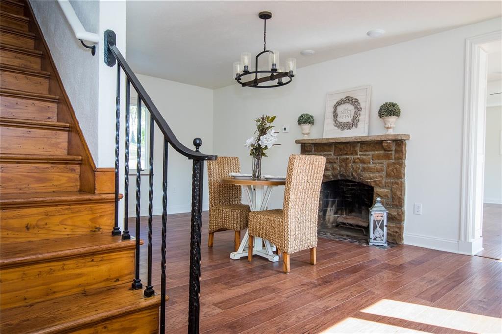 The dinning area is centrally located for family gatherings and can easily hold a large farm house table.  Place a cozy chair next to the wood burning fireplace, to read your favorite book.