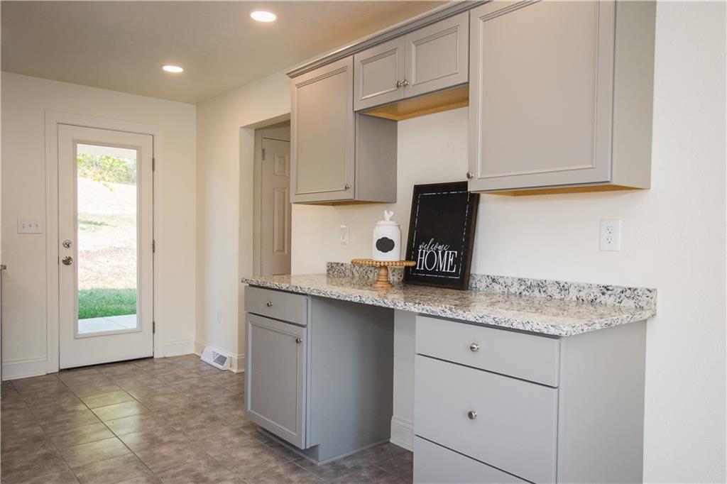 Lots of storage and counter top space.  A wine cooler/ frig can be placed in this space or leave as a work area by adding a stool.
