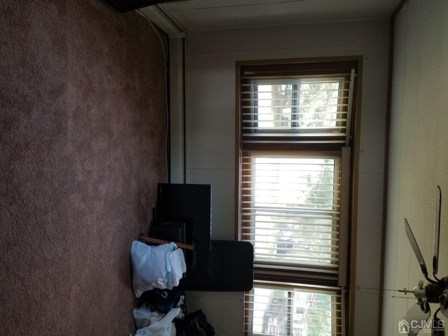 39 Emerson Road North Brunswick, NJ 08902 - Photo 20 of 23 a view of a room that has a large window