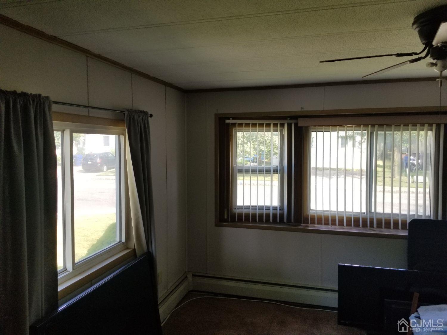 39 Emerson Road North Brunswick, NJ 08902 - Photo 21 of 23 a view of an empty room with a window