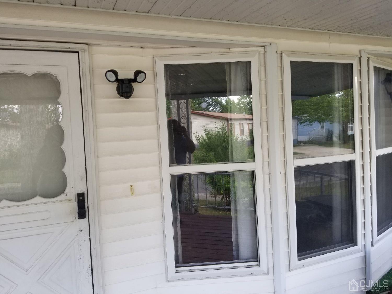 39 Emerson Road North Brunswick, NJ 08902 - Photo 6 of 23 a view of front door
