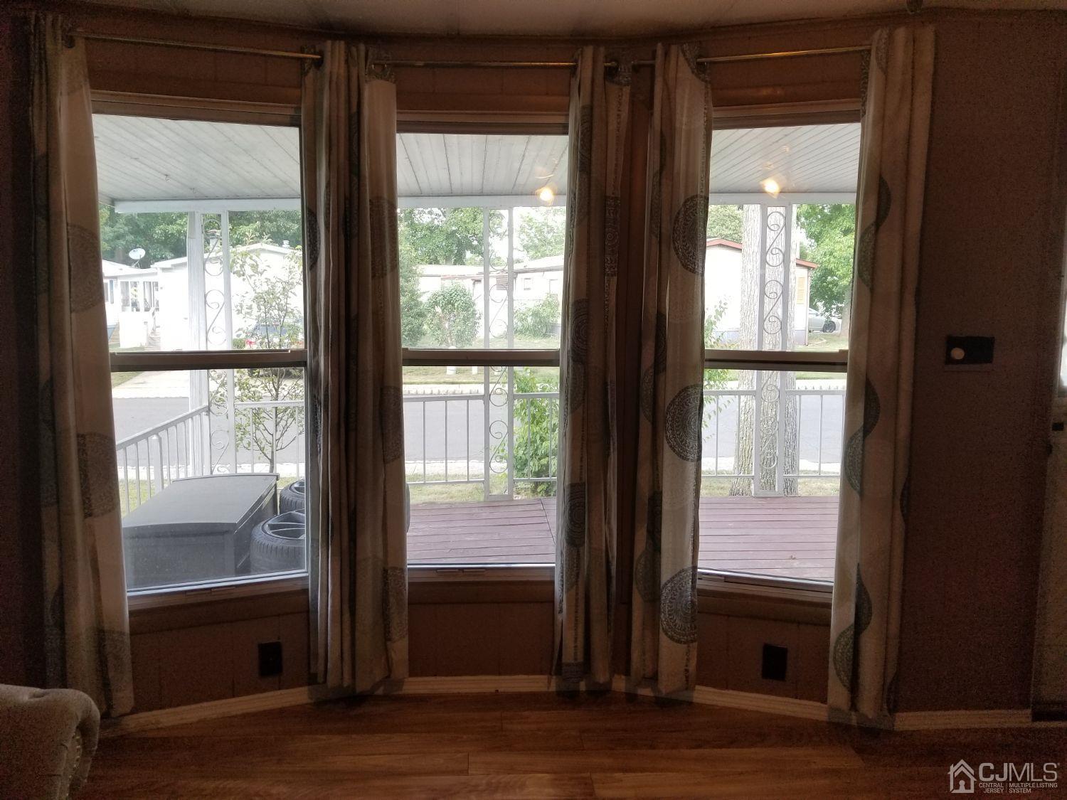 39 Emerson Road North Brunswick, NJ 08902 - Photo 9 of 23 a view of front door with wooden floor