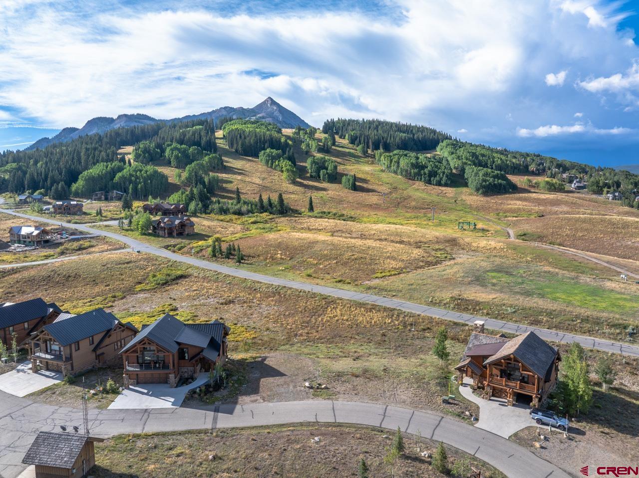8 Appaloosa Road Crested Butte, CO 81225 - Photo 1 of 25 a view of a lake with a yard