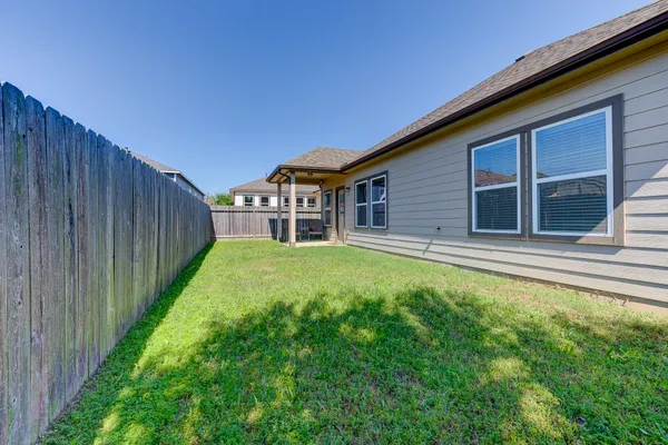 a house view with a garden space